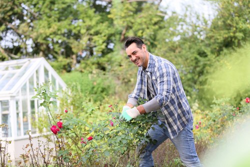 Soft landscaping team preparing soil and planting beds in Boundsgreen
